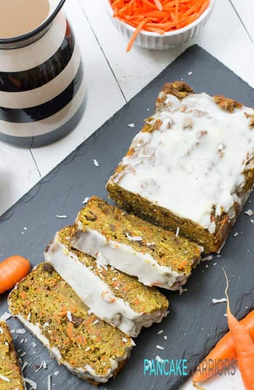 High protein carrot cake banana bread is the perfect afternoon snack or post workout treat! Gluten free, no refined sugars, high in protein, grain free and easy to make | www.pancakewarriors.com